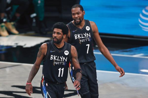 Kyrie Irving, left, and Kevin Durant