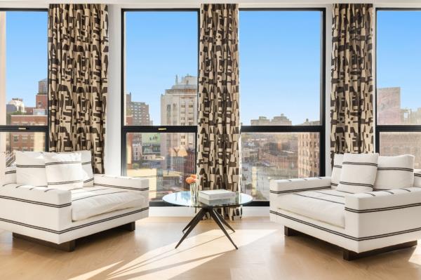Floor-to-ceiling windows allow for awesome views of the city skyline. 