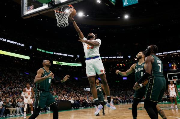 Mitchell Robinson scores during the Knicks' win over the Celtics on March 5. 