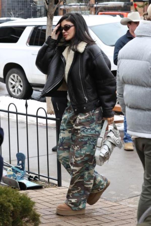 Kylie Jenner was spotted wearing the utilitarian trousers over New Year.