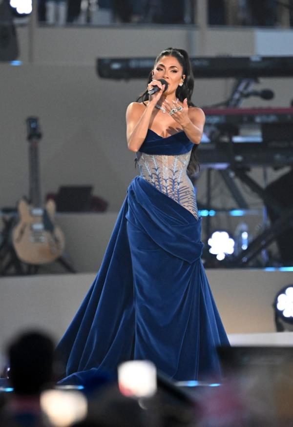 Nicole Scherzinger stunned in royal blue while performing at the coro<em></em>nation co<em></em>ncert Sunday. 