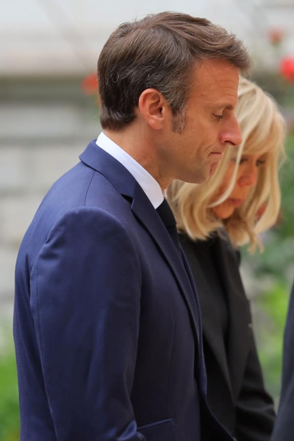 A photo of President Macron and his wife Brigitte.