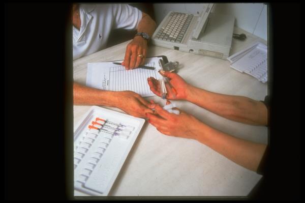 Harm reduction has its earliest roots in needle exchange programs such as this one that helped prevent the spread of HIV during the 1980s. 