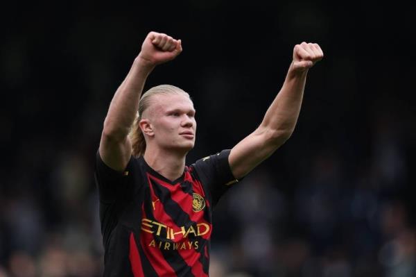 Manchester City's Norwegian striker Erling Haaland celebrates on the pitch after the English Premier League football match between Fulham and Manchester City at Craven Cottage in Lo<em></em>ndon on April 30.. - Man City won the game 2-1. - Pic: AFP