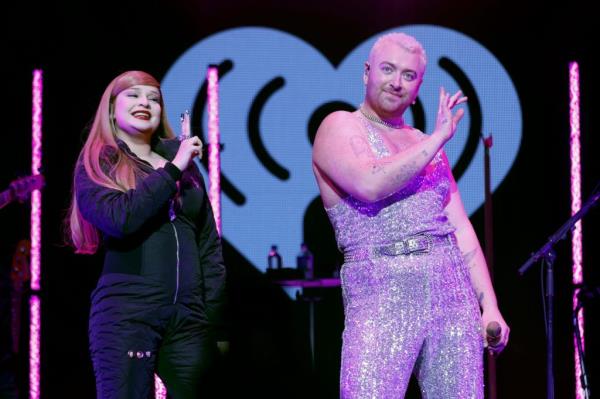 Kim Petras and Sam Smith perform on stage at iHeartRadio Hot 99.5 Jingle Ball on Dec. 13, 2022, in Washington, DC. 