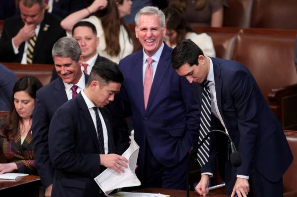 House Minority Leader Kevin McCarthy talks to aids as the House of Representatives holds their vote for Speaker of the House, on the first day of the 118th Co<em></em>ngress in the House Chamber of the U.S. Capitol Building on January 03, 2023 in Washington, DC.