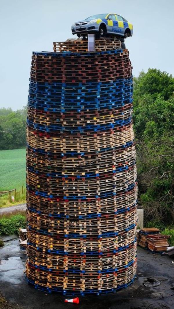 A police car on top of the Moygashel Bonfire
