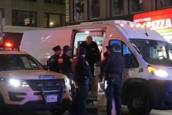 A gunman opened fire toward a bicyclist but instead struck an occupied delivery van at West 36th Street and Seventh Avenue, cops said.