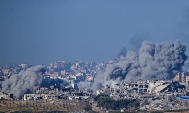 A picture taken from southern Israel near the border with the Gaza Strip shows smoke billowing following an Israeli strike on Monday